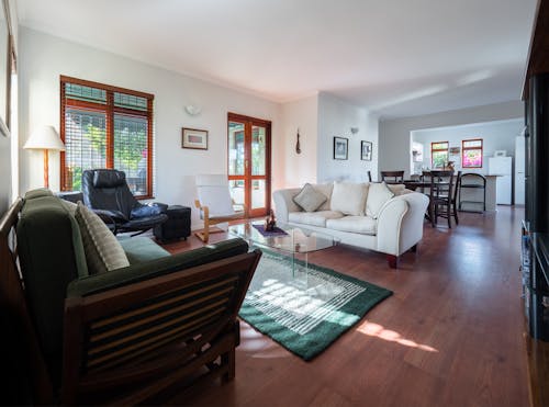 Photo Of White Sofa Near Glass Table