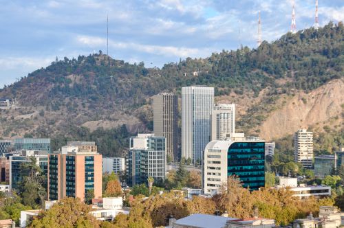 Free Aerial view of Santiago's skyline with San Cristóbal Hill in the background. Stock Photo