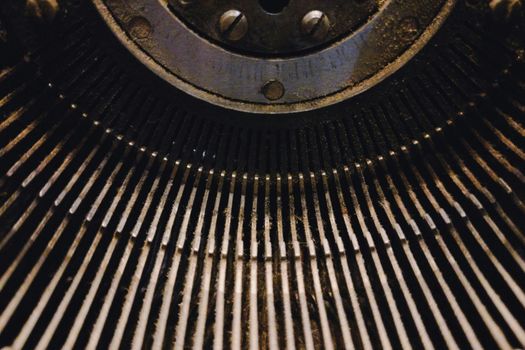 Detailed view of vintage typewriter keys showing mechanical complexity.