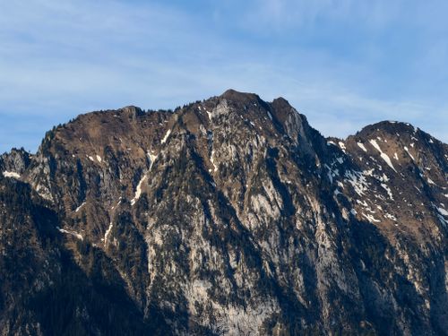 Free Breathtaking view of snow-capped mountains in the Swiss Alps with a clear blue sky. Stock Photo