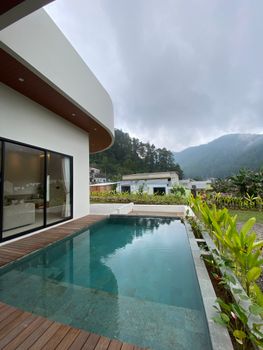 A serene villa with a pool located in the lush hills of Central Java, Indonesia.