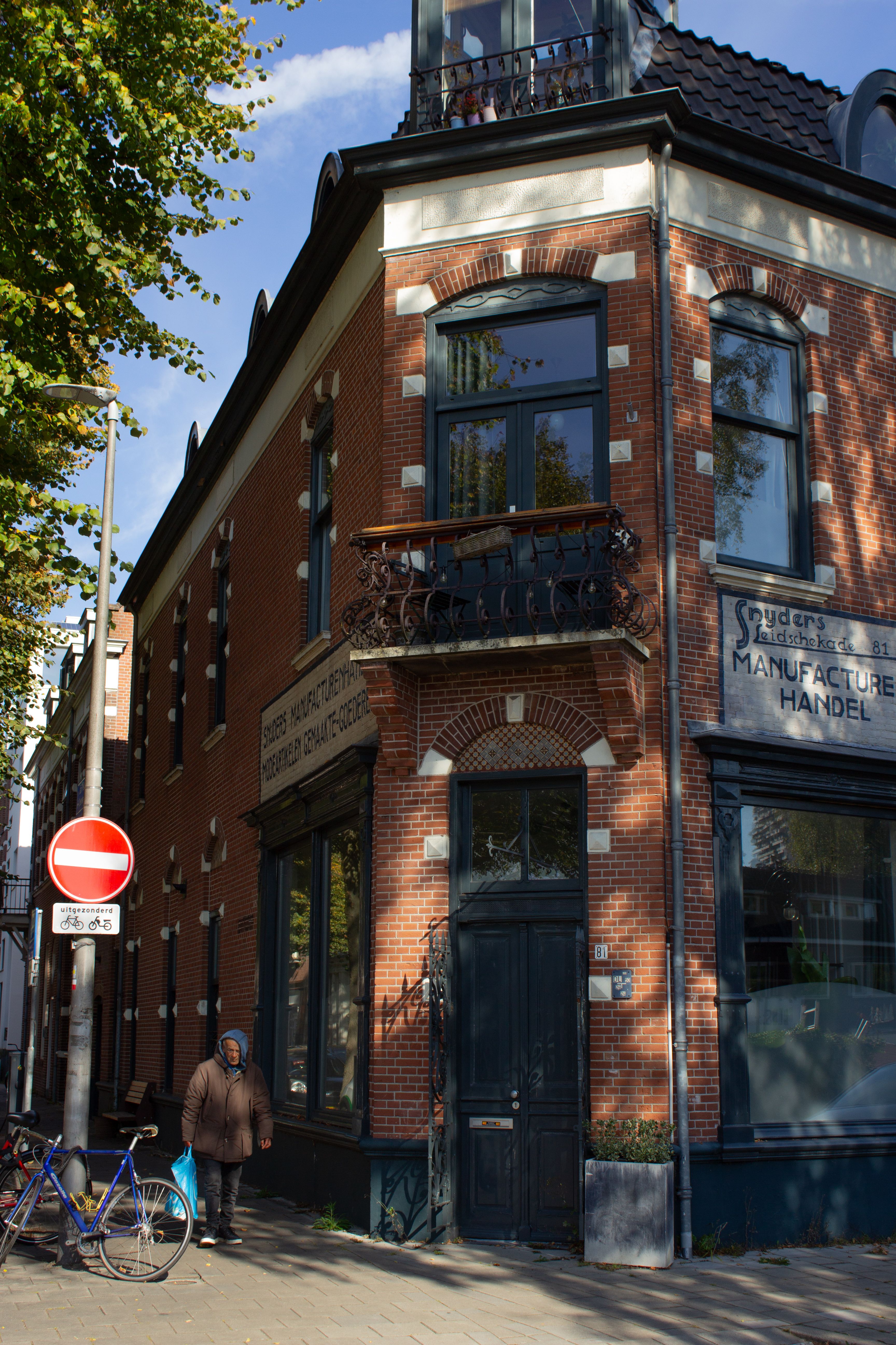 Charming historic Dutch architecture in Utrecht, illuminated by warm daylight with a vintage atmosphere.