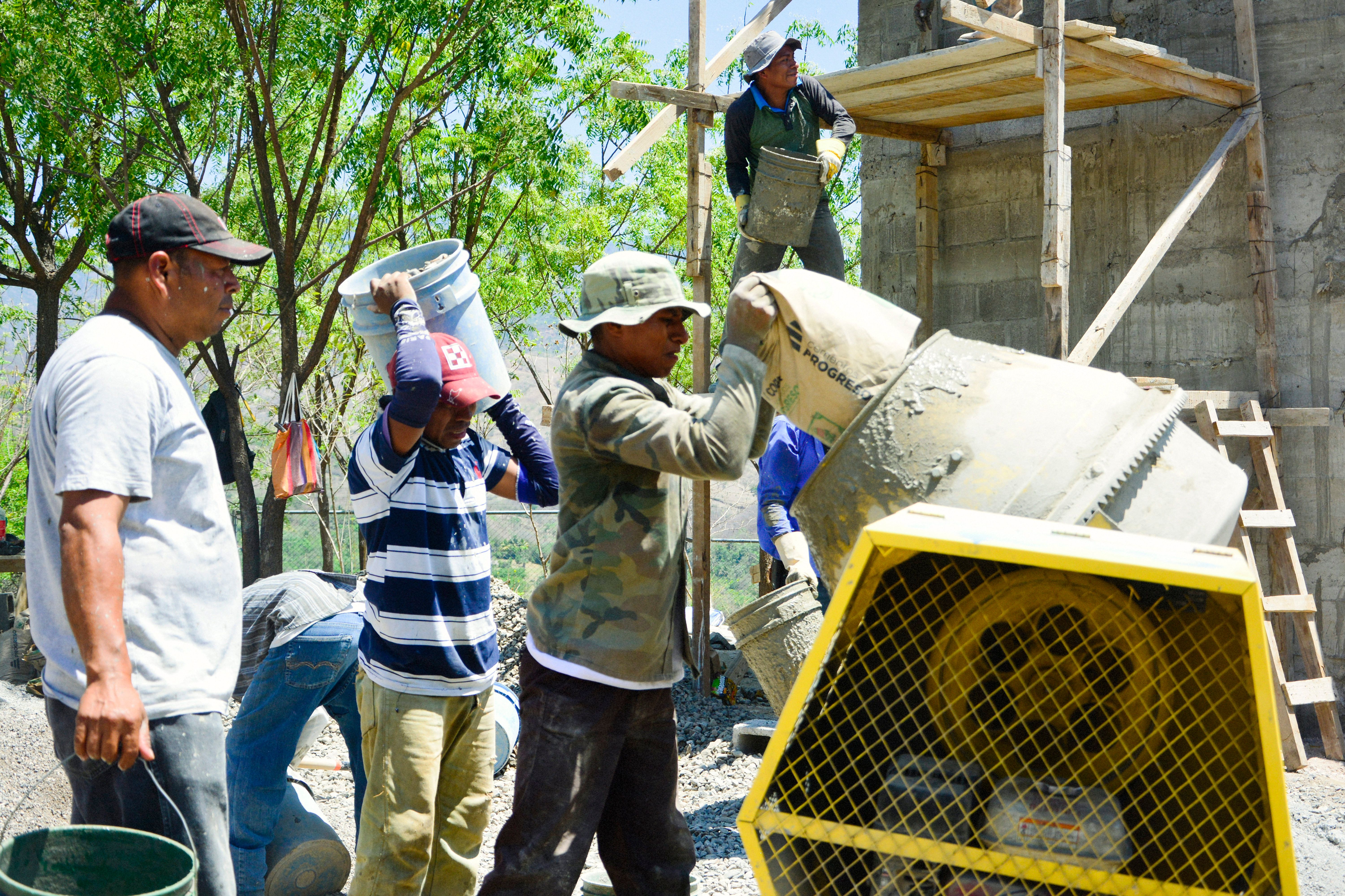 Cement bags stacked at a construction site in Bengaluru, ready for use