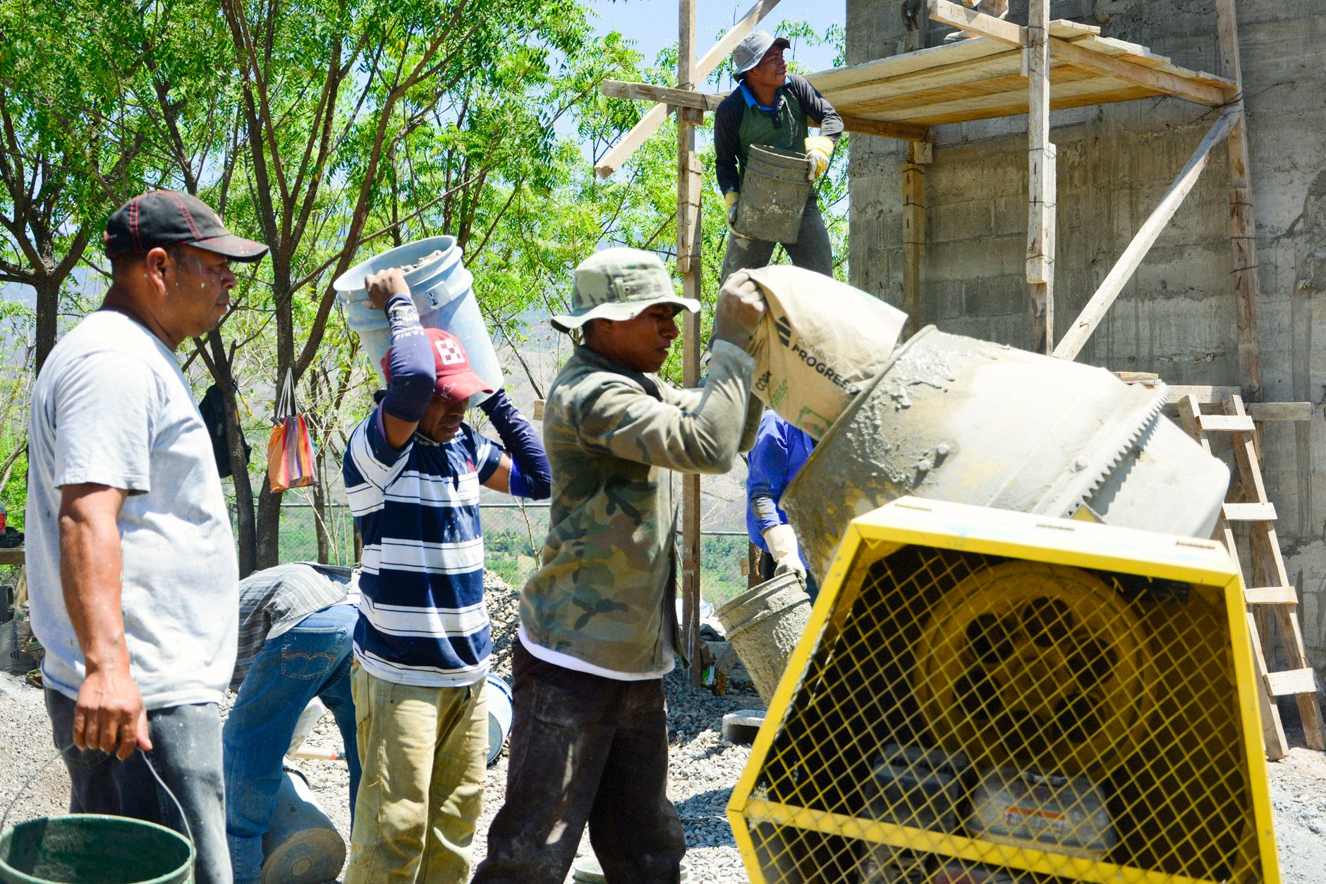 Cement bags stacked at a construction site in Bengaluru, ready for use
