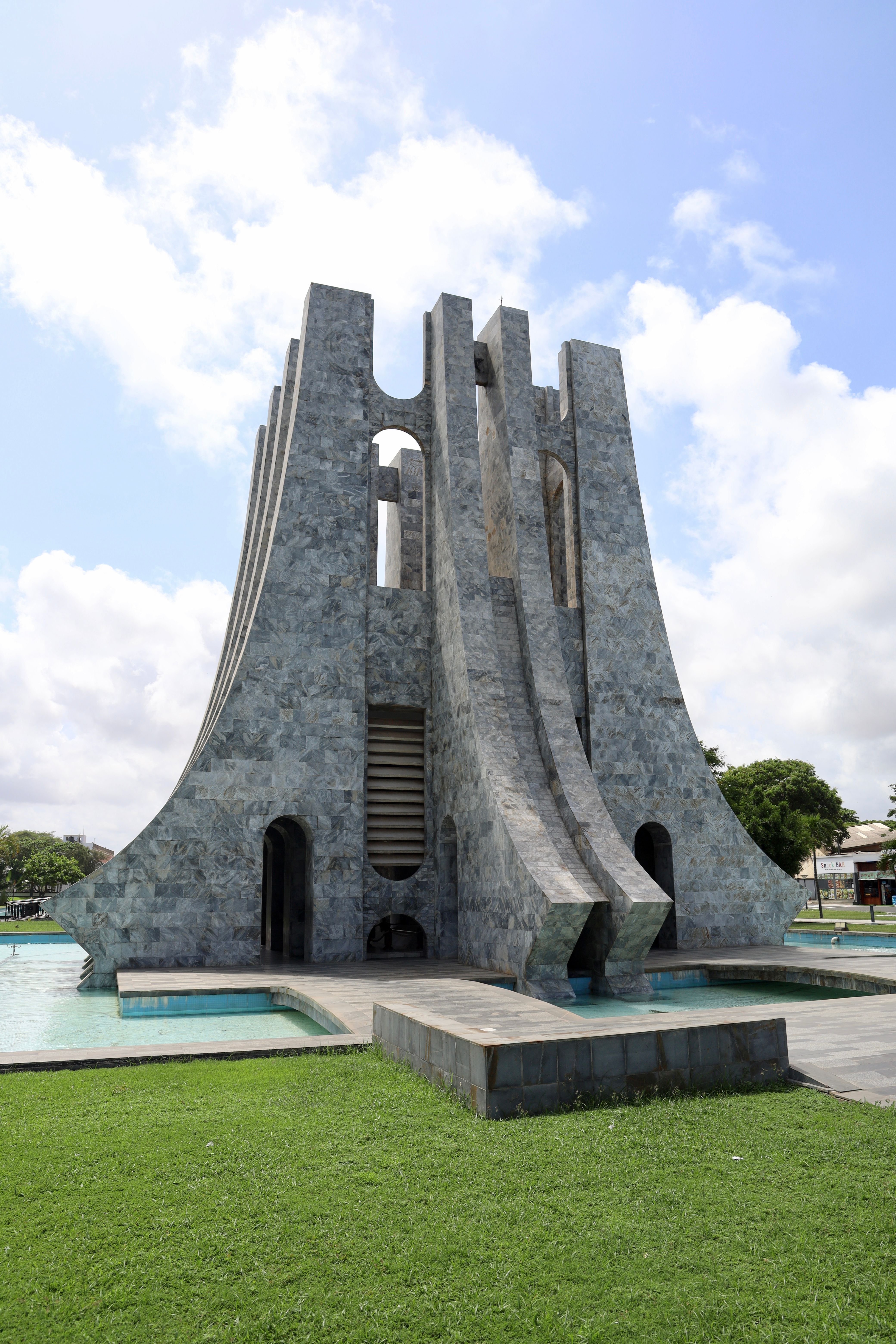 Majestic view of the Kwame Nkrumah Mausoleum under a sunny sky in Accra, Ghana.