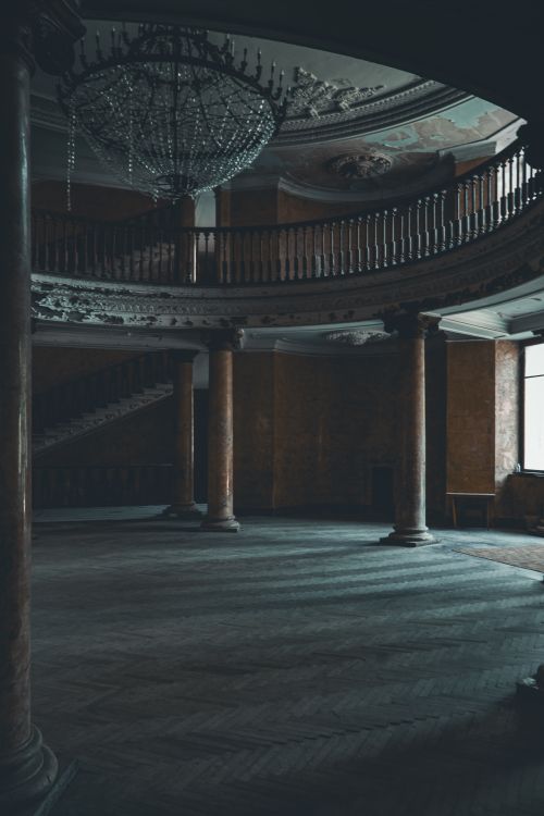 Free Explore the mysterious interior of an abandoned Soviet-era spa resort in Tskaltubo, Georgia, captured in moody lighting. Stock Photo