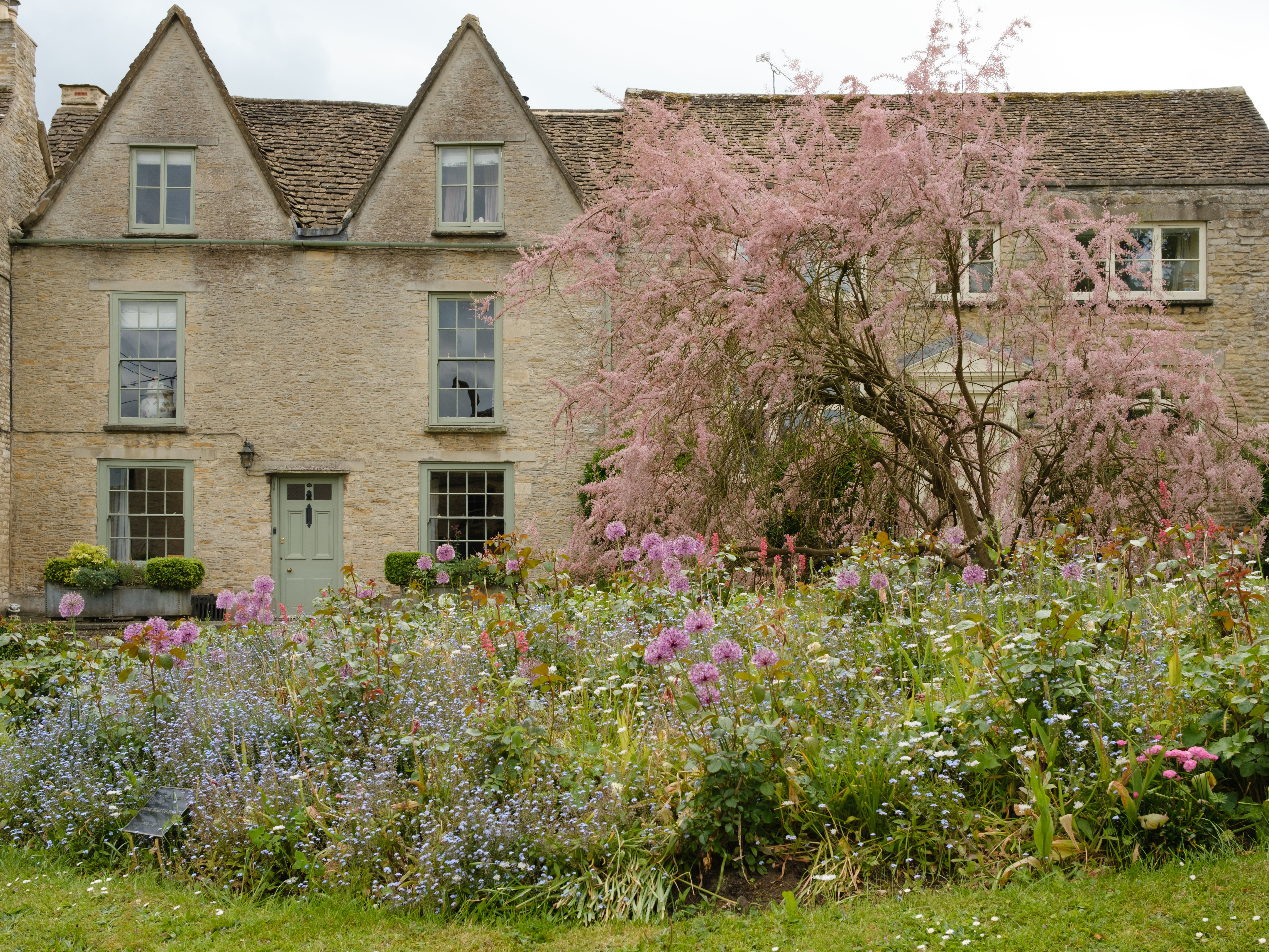 Stone cottage with a spring garden — photo by Ben Prater on Pexels