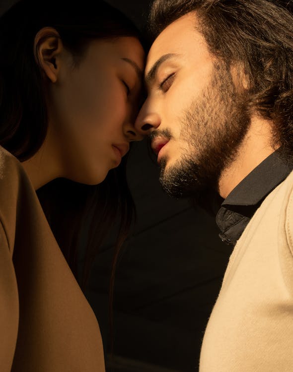 Free Man and Woman Closing Their Eyes Stock Photo