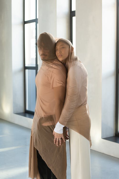 Free Couple Covered in Sheer Fabric Stock Photo