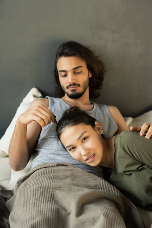 Free Couple Relaxing at Home Stock Photo