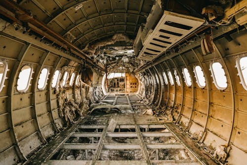 Interior of crashed aircraft cabin with windows
