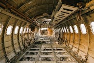 Interior of crashed aircraft cabin with windows