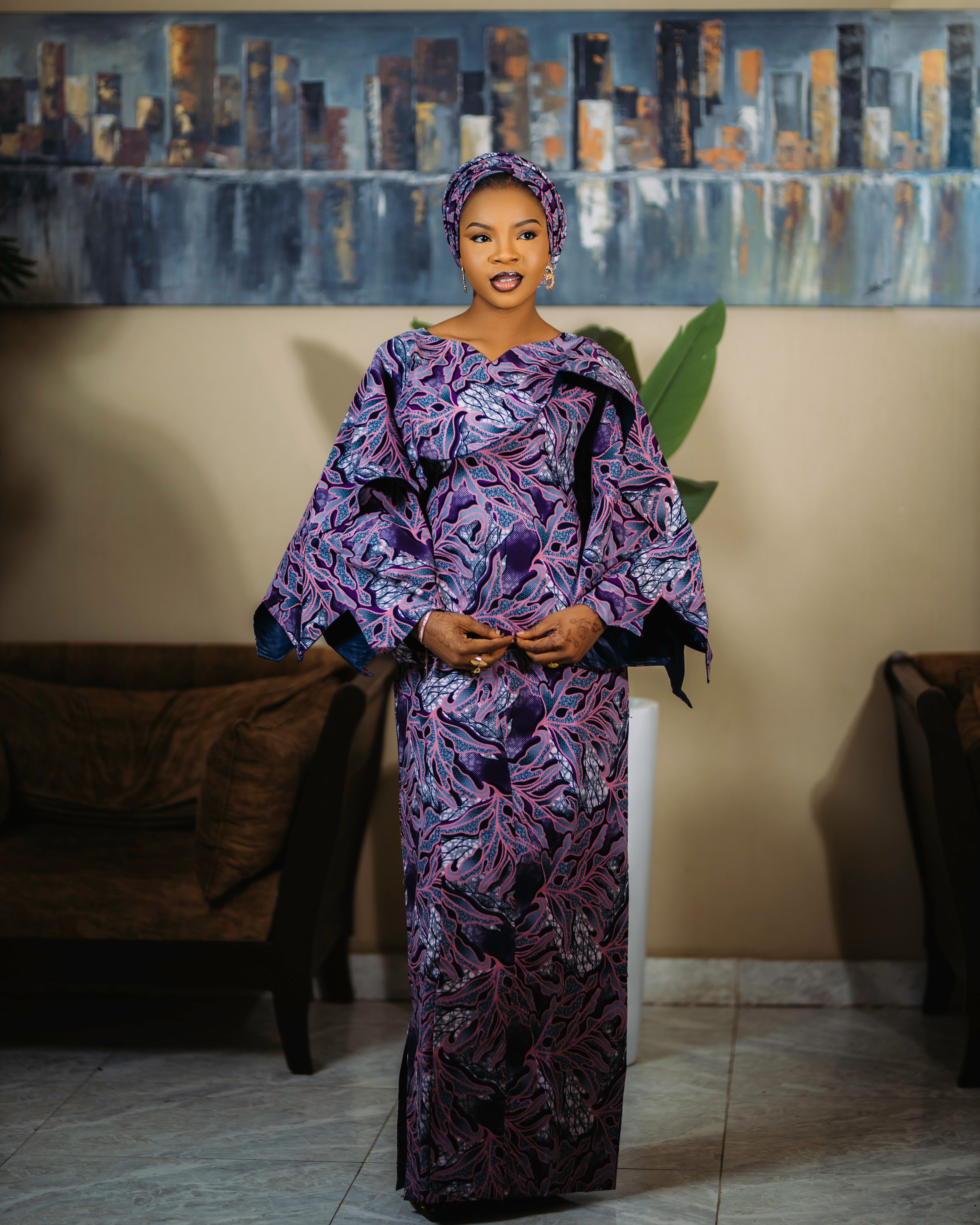 Elegant Woman in Traditional Attire Indoors · Free Stock Photo