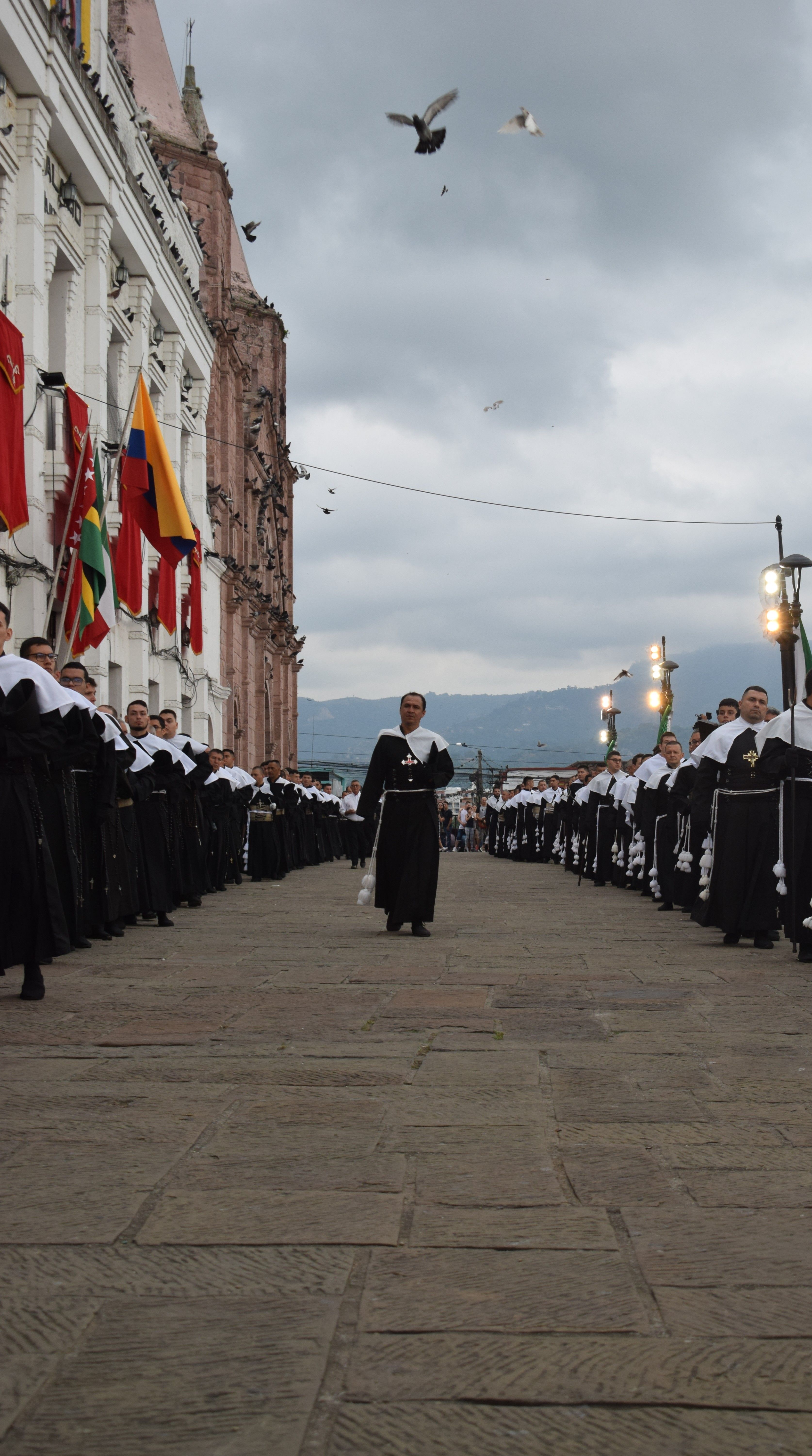 Traditional Procession with Clergy in Historic Setting · Free Stock Photo