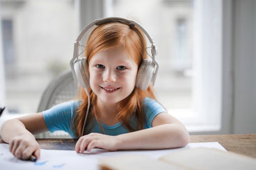 Free Photo of Girl Wearing White Headset Stock Photo