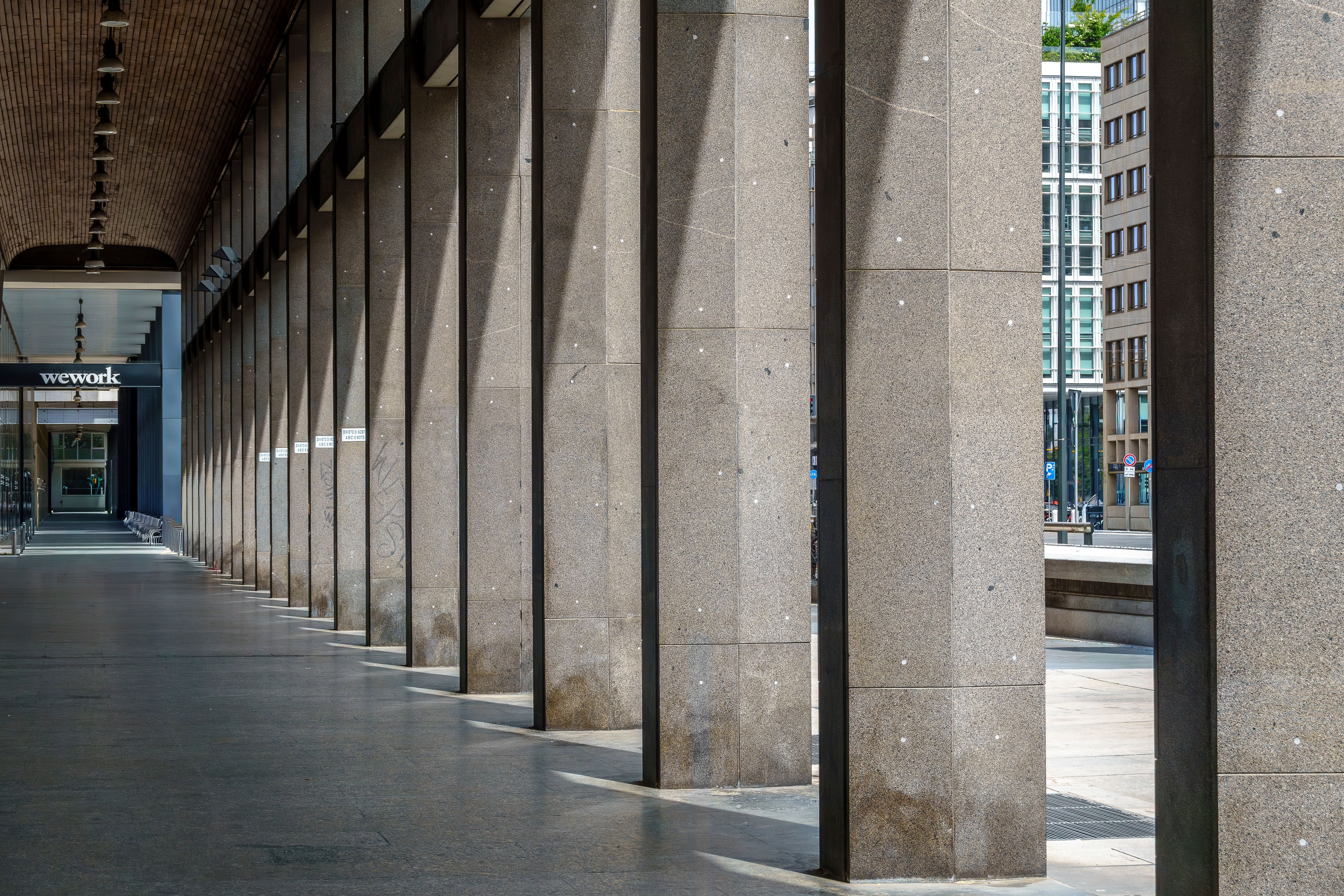 Modern Urban Architecture with Sunlit Columns · Free Stock Photo