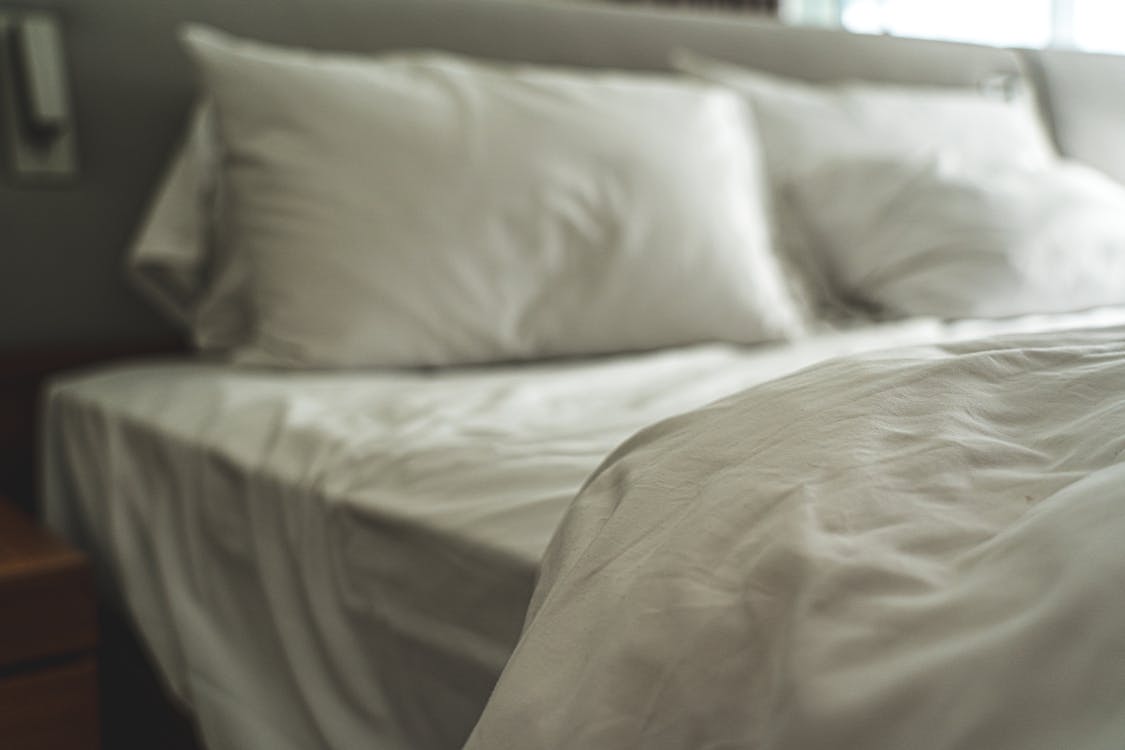 Free White Bed with Pillows Stock Photo