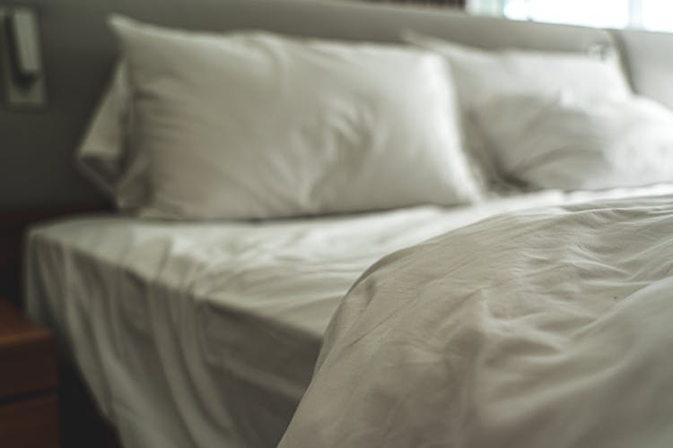White Bed With Pillows