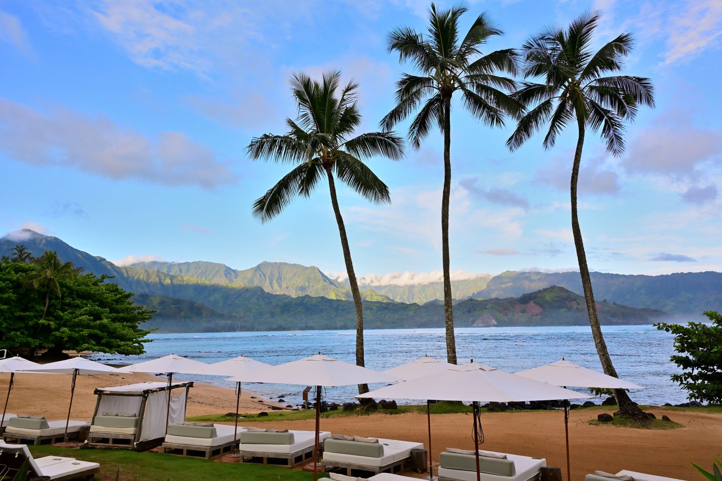 Green mountains dropping to the bay on the north shore of Kauaʻi