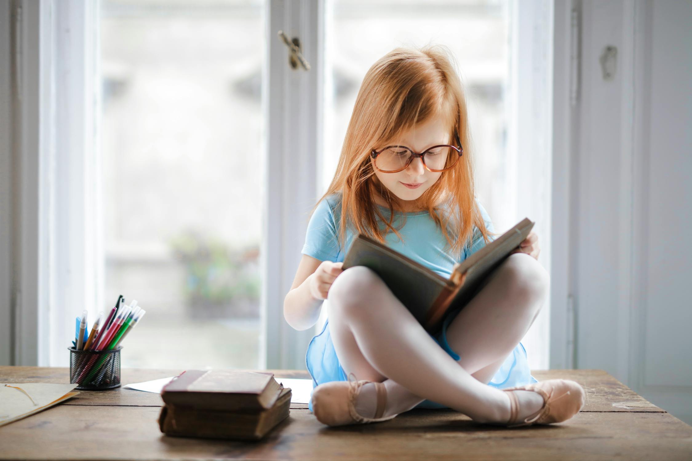 Kids with Books Photo by Andrea Piacquadio from Pexels