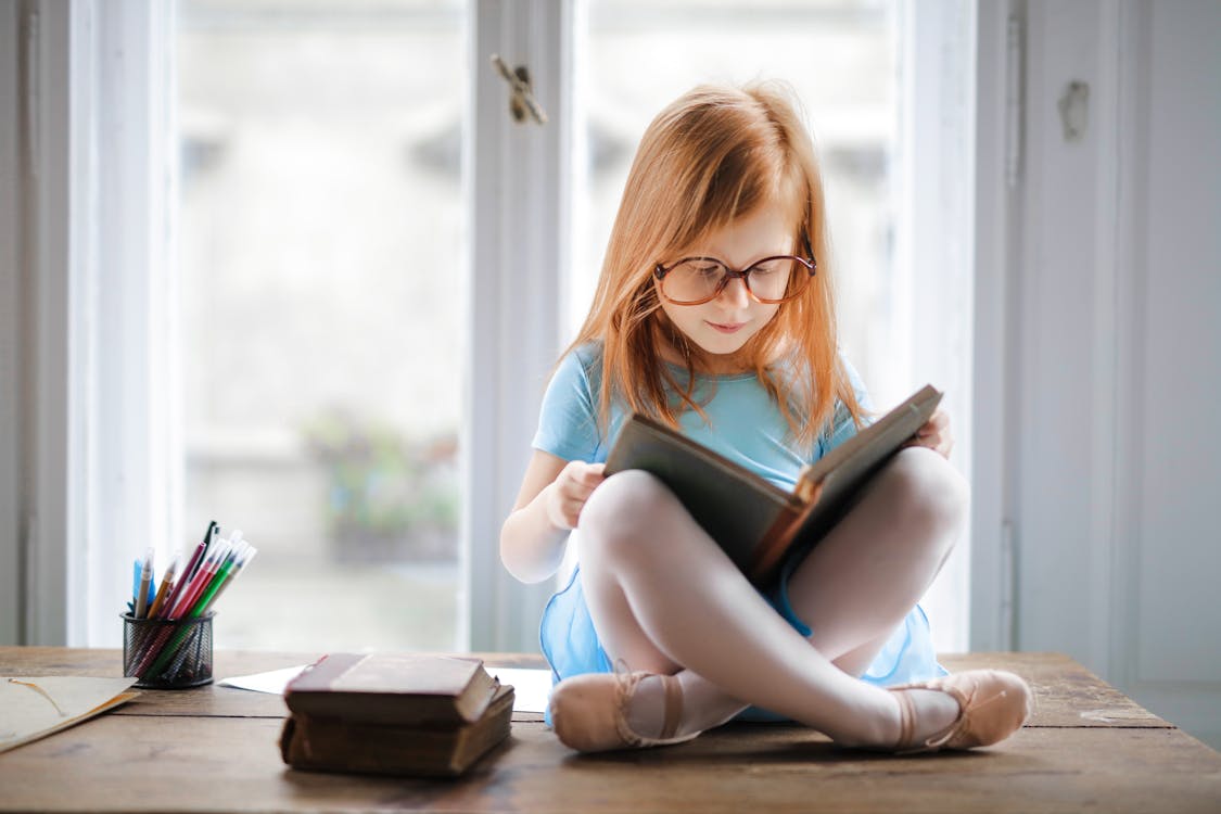 Girl reading and learning