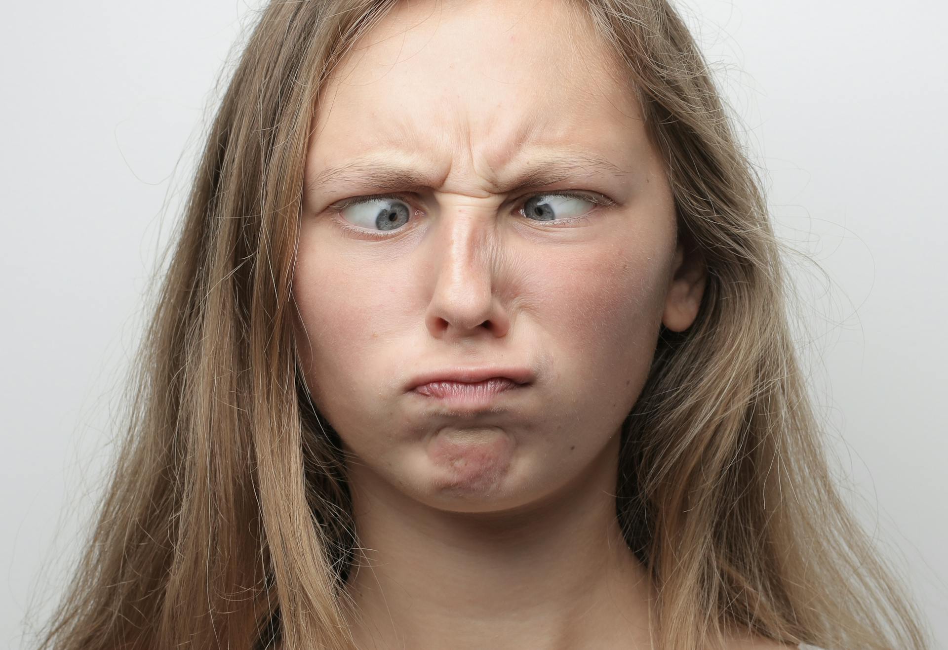 Crossed eyes Woman In White Background