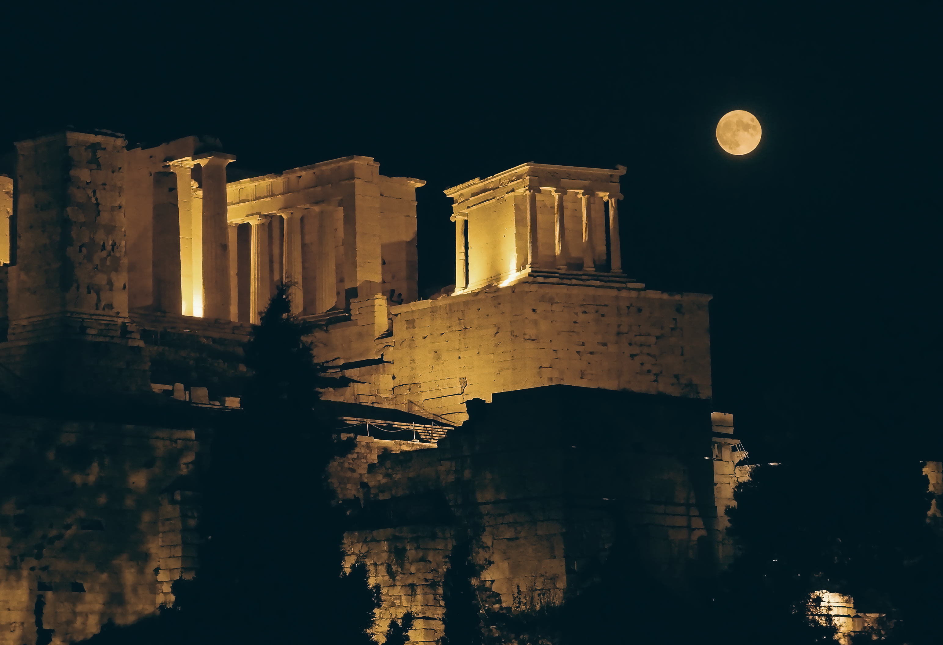 Acropolis Athens night floodlit Parthenon from below