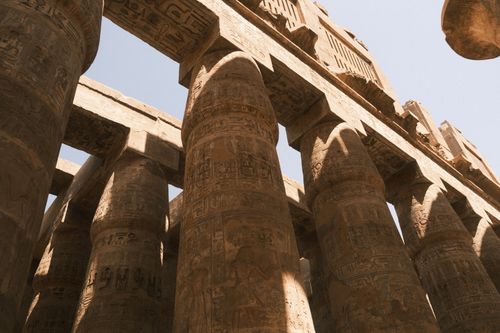 Free Capture of towering ancient columns at Karnak Temple in Luxor, Egypt. Stock Photo