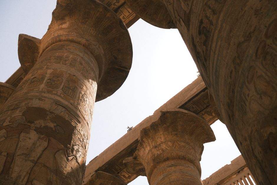Explore the grandeur of Karnak Temple's ancient columns in Luxor, Egypt, showcasing rich Egyptian architecture.