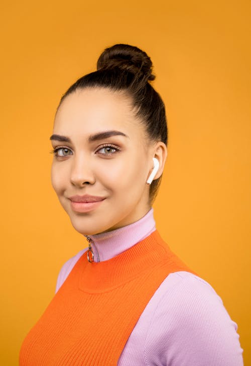 Woman in Orange Crew Neck Shirt