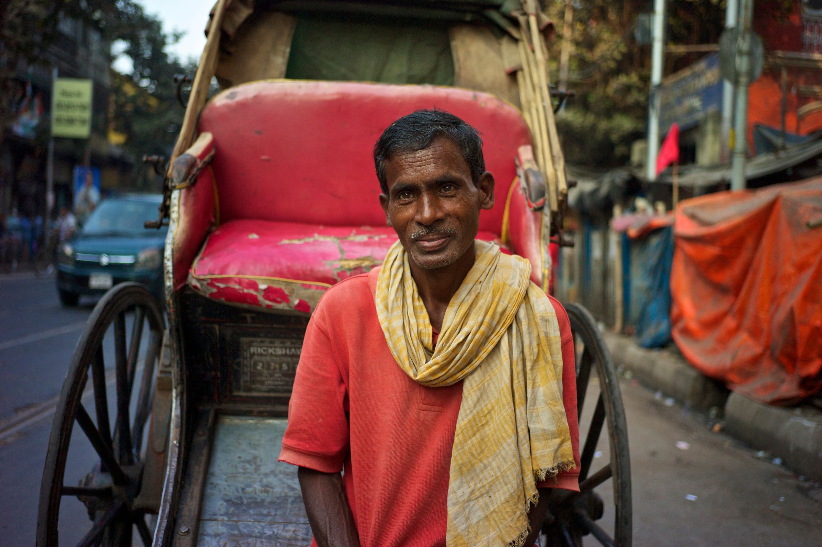 Traditional Rickshaw Puller in Kolkata Street · Free Stock Photo
