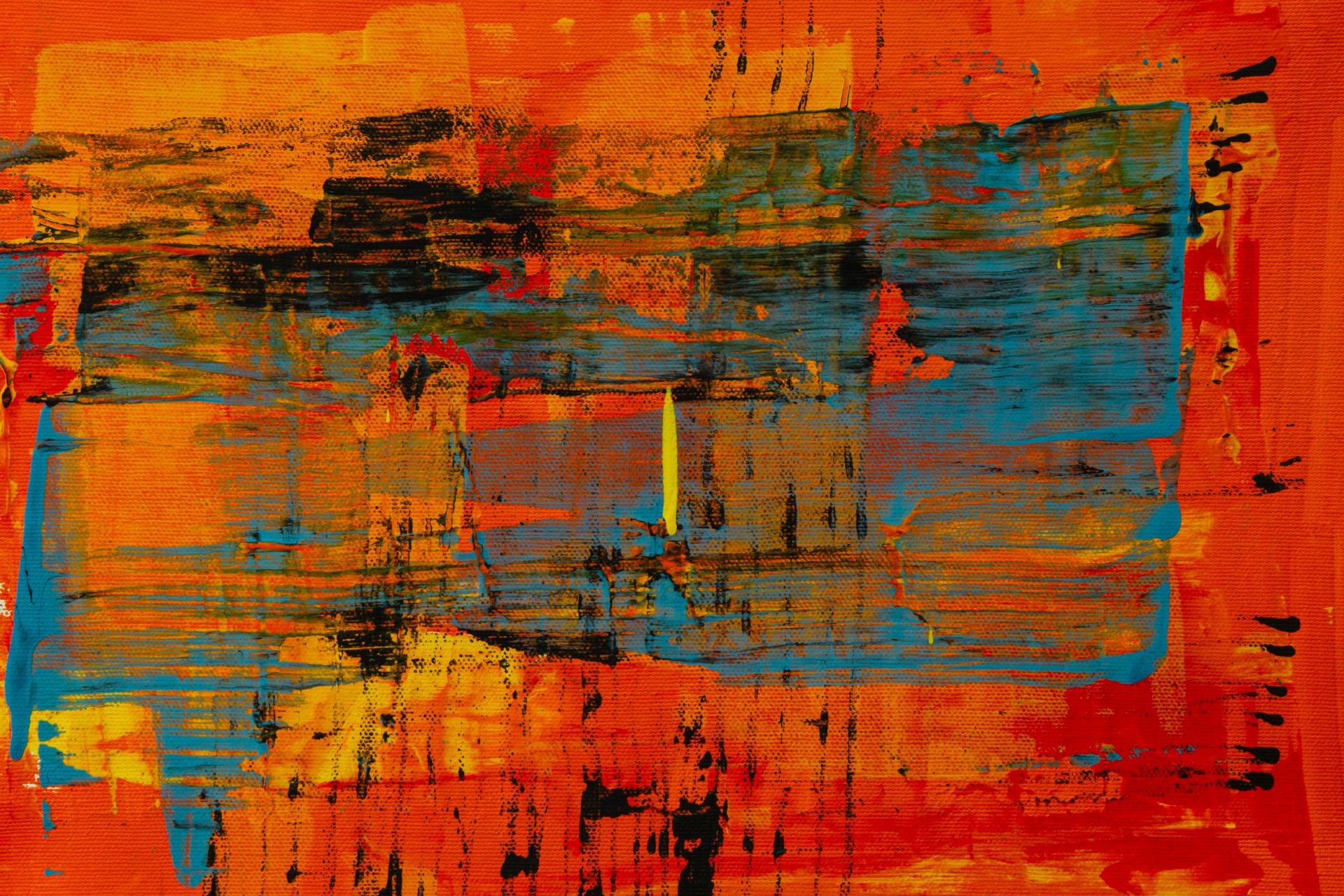 Colorful abstract acrylic painting with bold orange and blue strokes on canvas.