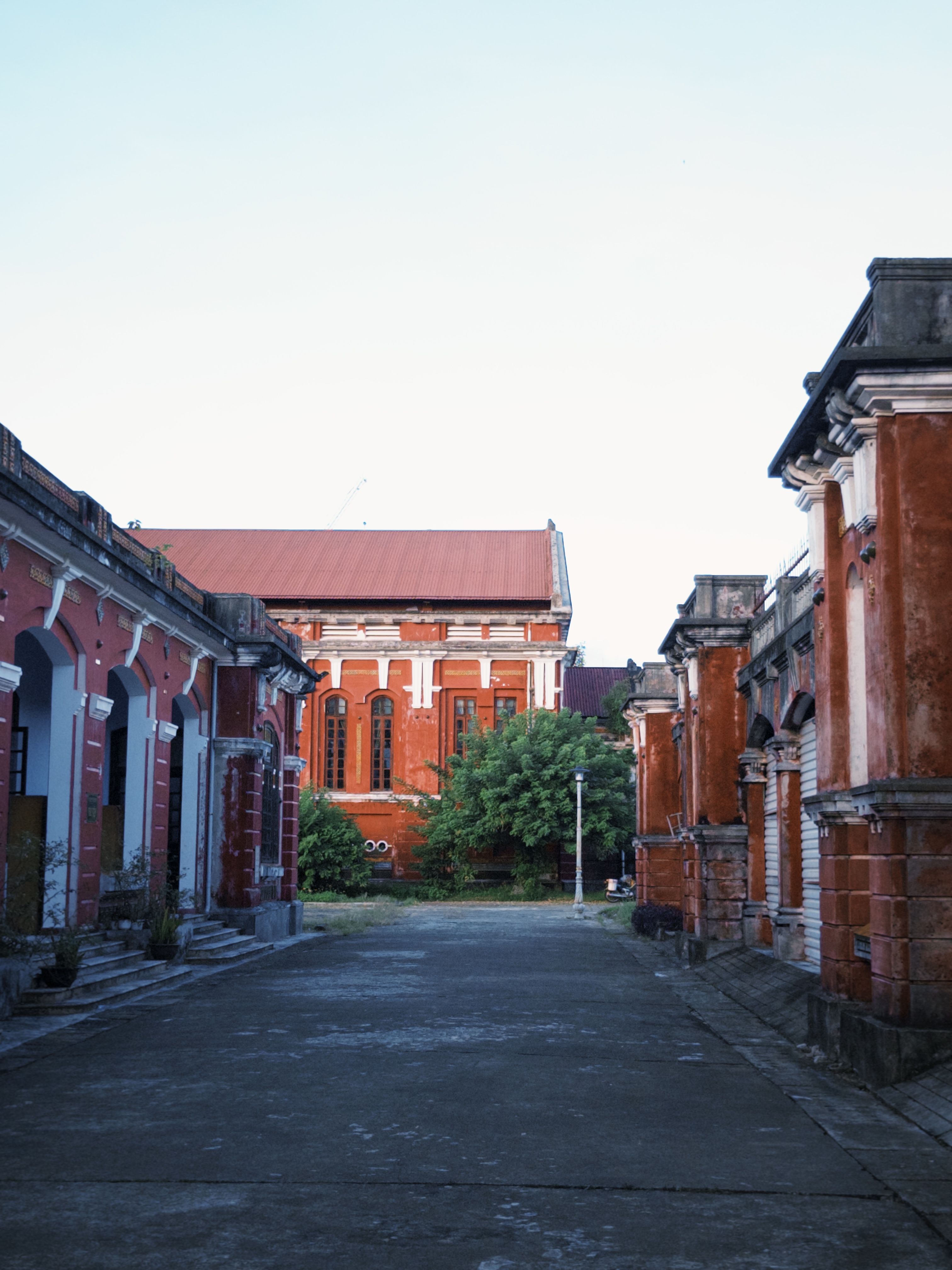 Historic Red Brick Buildings at Twilight · Free Stock Photo