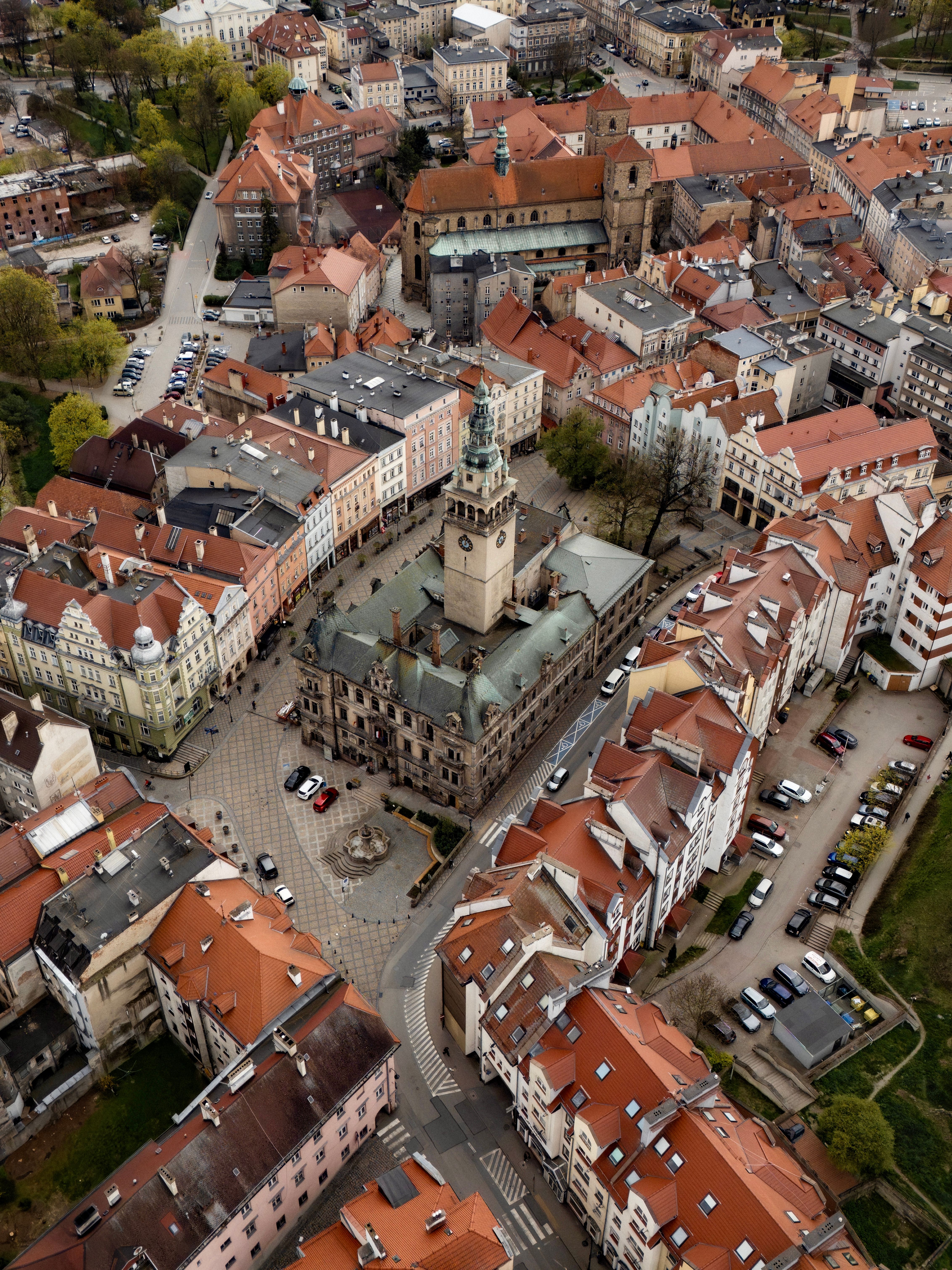 Aerial view showcasing the historic architecture of a town square featuring a prominent clock tower.