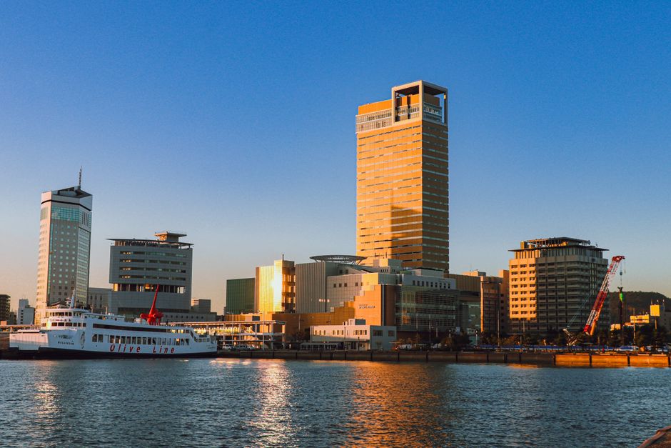 Stunning sunset highlights the skyline and port area of Sunport Takamatsu in Kagawa, Japan.