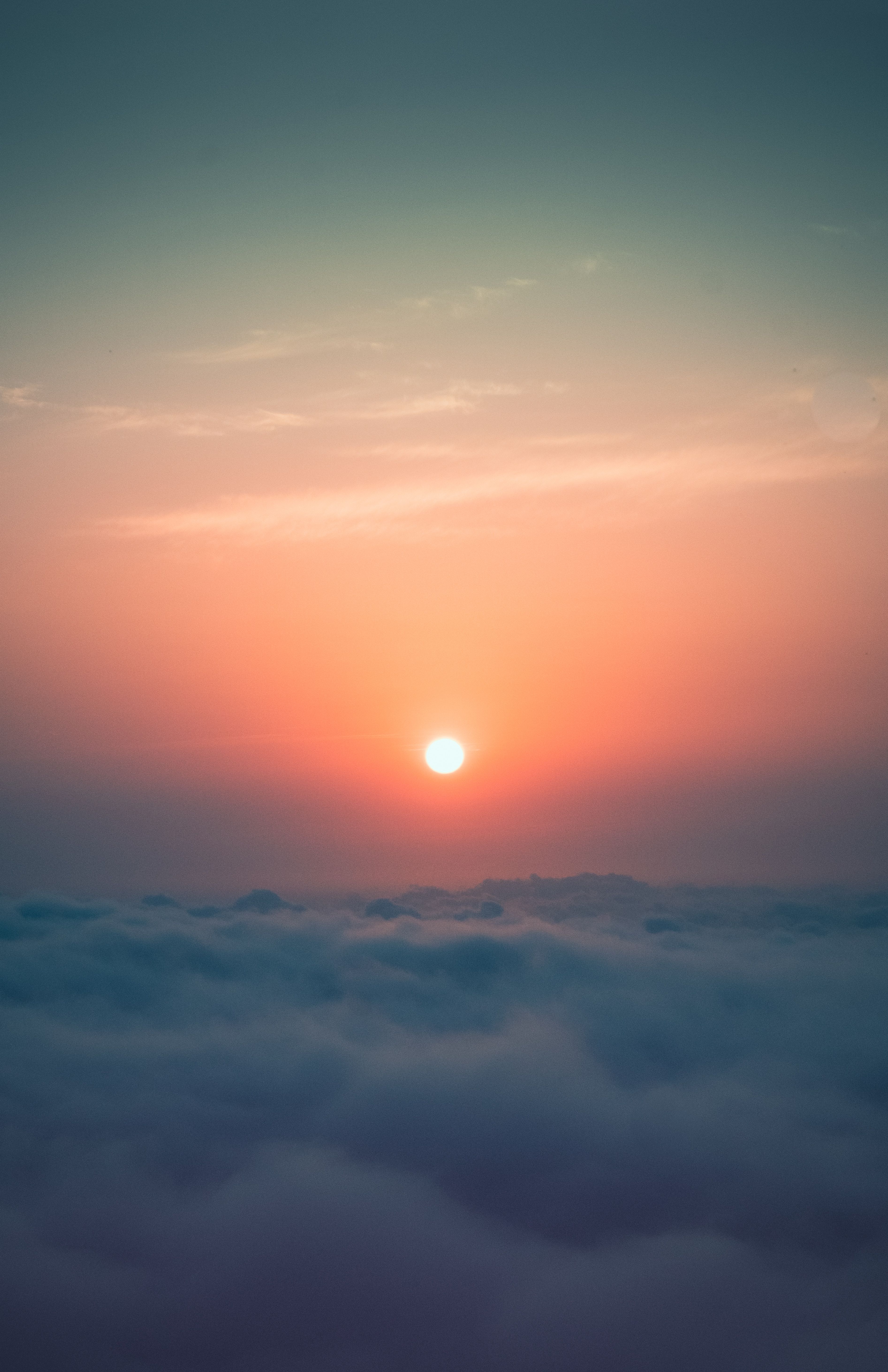Free Beautiful sunrise over clouds in Gomi, Georgia, capturing vibrant colors and tranquil sky. Stock Photo