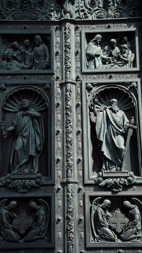 Free Detailed bronze door sculpture at Saint Isaac's Cathedral, St. Petersburg, depicting biblical scenes. Stock Photo