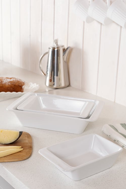 White Containers On A Counter