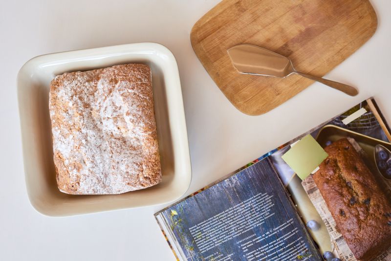 Cookbook on a linen surface — photo by Alexy Almond on Pexels