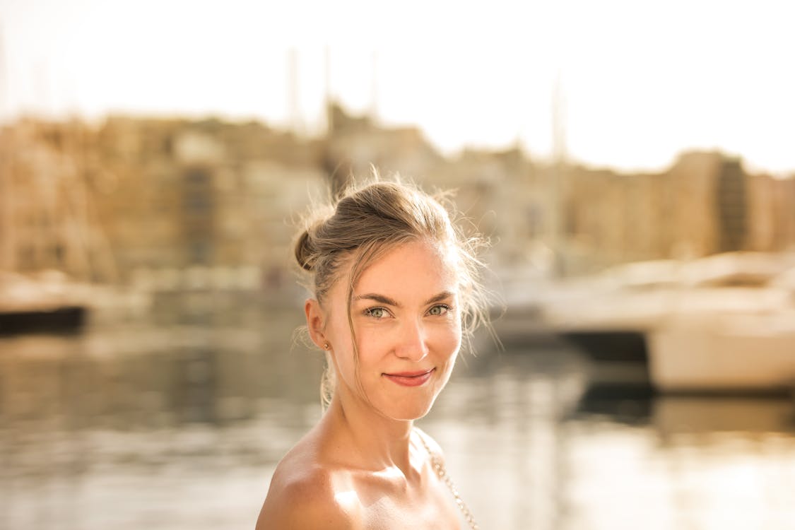 Close-Up Photo of Woman Smiling