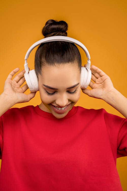 Free Photo of Woman Using White Headphones Stock Photo