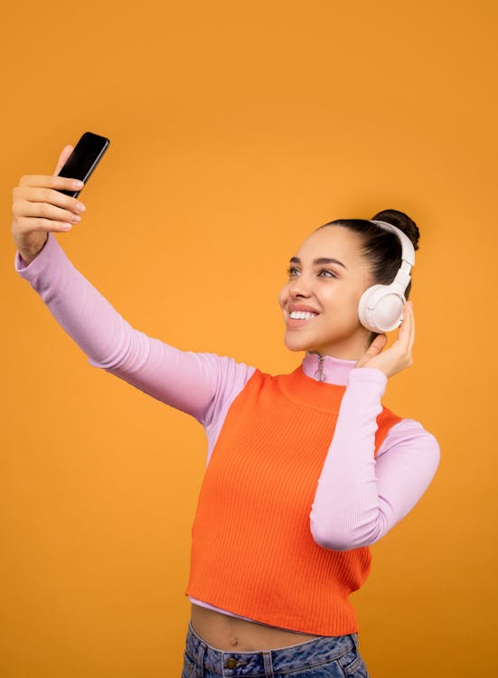 Photo of Woman Holding Mobile Phone