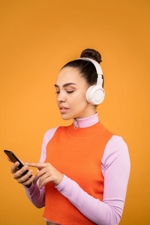 Free Photo of Woman Using Mobile Phone Stock Photo