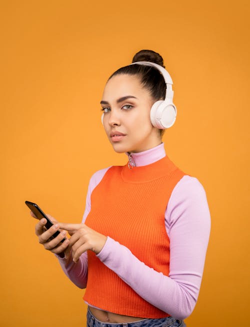 Photo of Woman Listening to Music