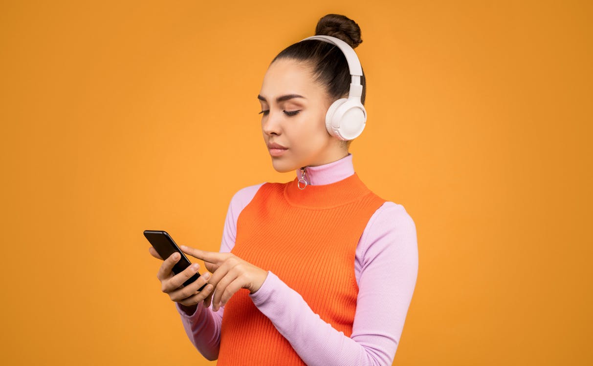 Photo Of Woman Using Her Mobile Phone