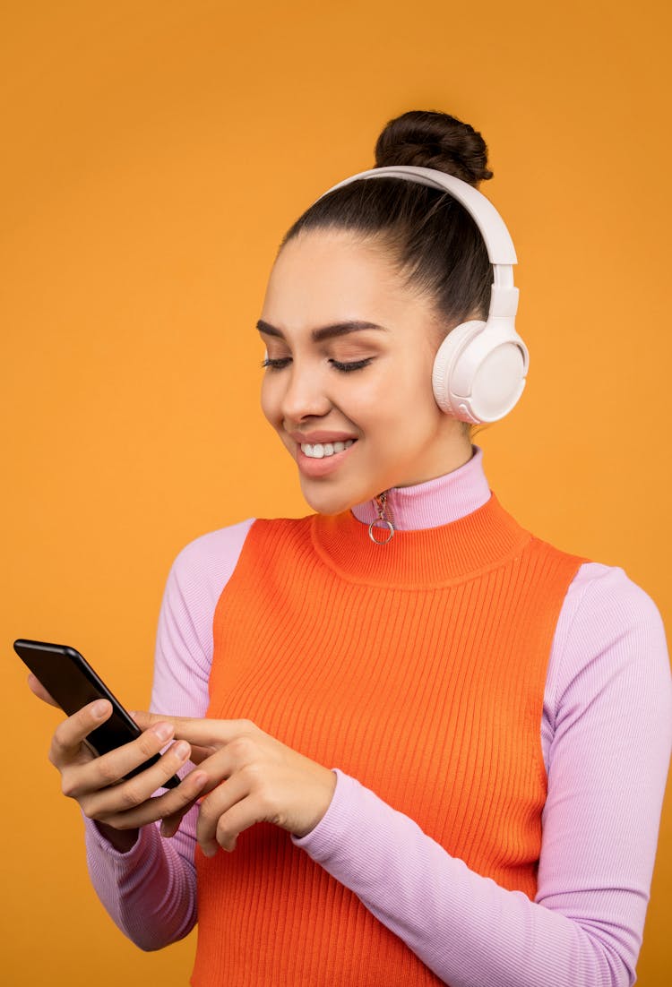 Photo Of Woman Using Her Mobile Phone