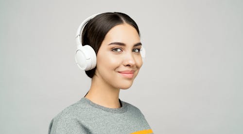 Free Photo of Woman Wearing White Headphones Stock Photo