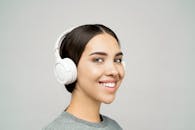 Lovely Lady Wearing a White Headphones