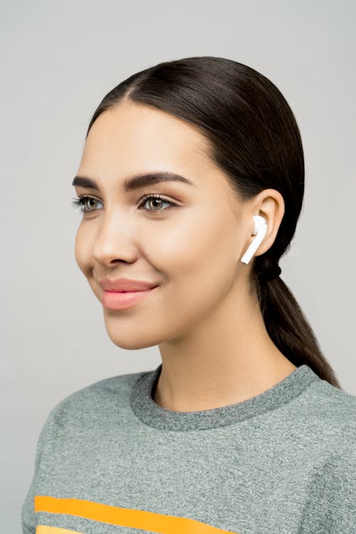 Photo of Woman Wearing Gray Top