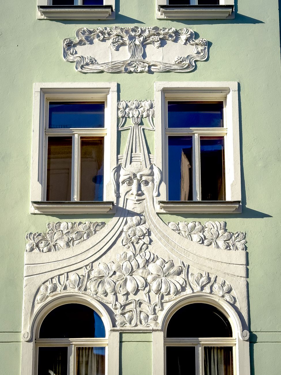 Detailed Art Nouveau facade with ornate designs and curved windows in Zittau, Germany.. detailed, nouveau, facade